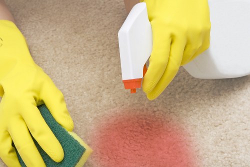 Office cleaners maintaining a modern workspace in SE16