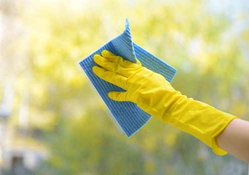 Carpet cleaner using protective gear during a safe cleaning job in SE16